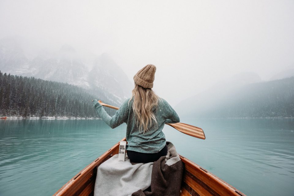 photo of a women in a boat